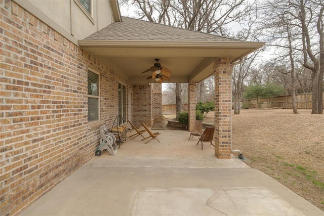 view of patio / terrace with a fenced backyard and ceiling fan