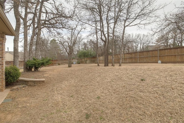 view of yard featuring a fenced backyard