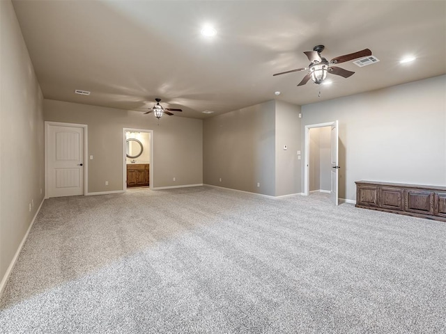 unfurnished room with visible vents, light carpet, recessed lighting, baseboards, and ceiling fan