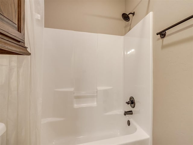 full bathroom featuring shower / bath combination with curtain