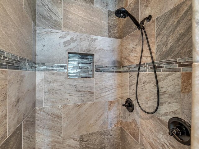 details featuring a tile shower