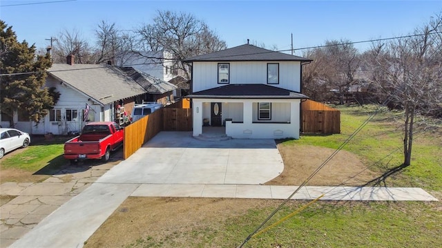 1612 N Klein Ave, Oklahoma City, OK 73106 - view of front of house with driveway, a front lawn, and fence