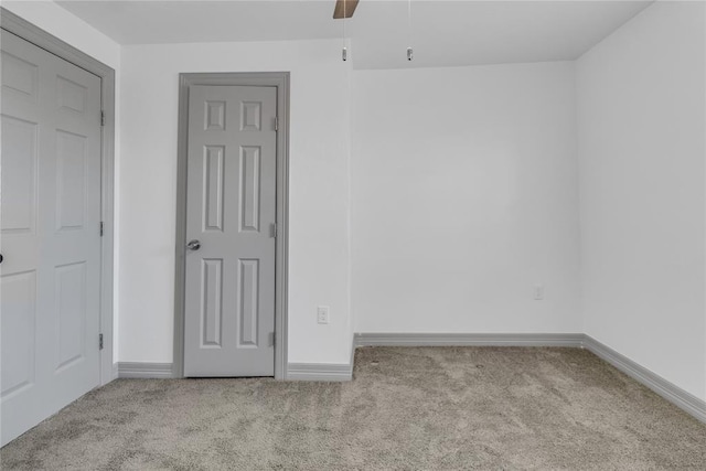 1612 N Klein Ave, Oklahoma City, OK 73106 - unfurnished bedroom featuring a ceiling fan, baseboards, and carpet floors