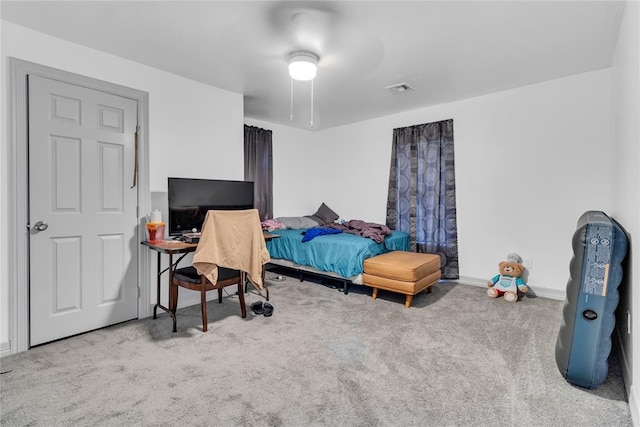 1612 N Klein Ave, Oklahoma City, OK 73106 - carpeted bedroom with baseboards, visible vents, and ceiling fan