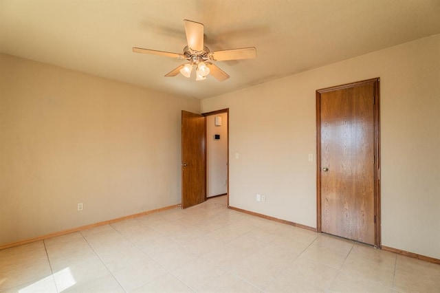 unfurnished bedroom with baseboards and ceiling fan