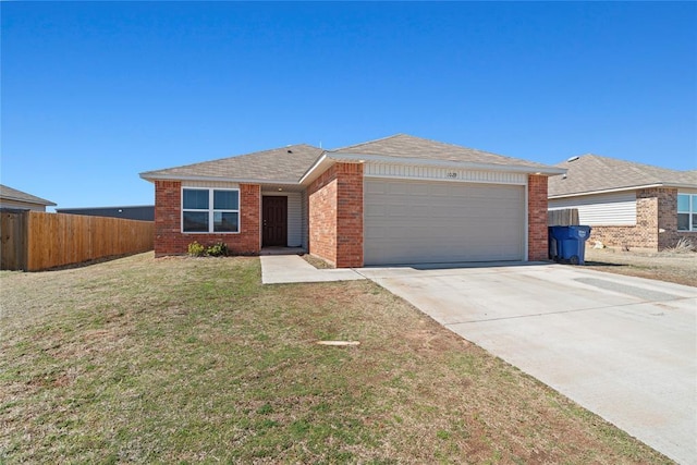 ranch-style house featuring a garage, brick siding, driveway, and fence