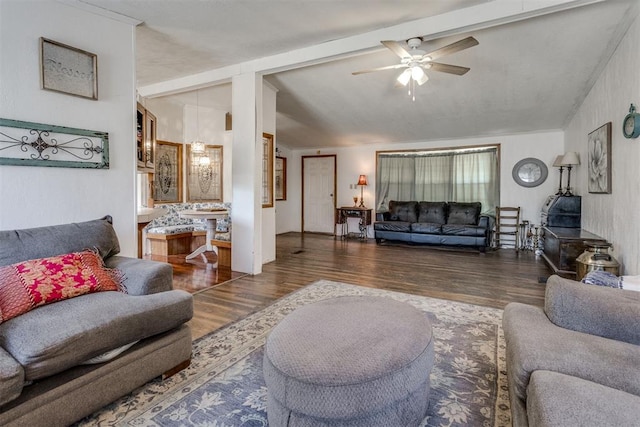 living room featuring lofted ceiling with beams, wood finished floors, and a ceiling fan