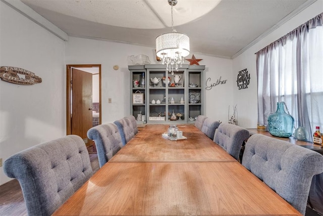 dining room featuring a chandelier