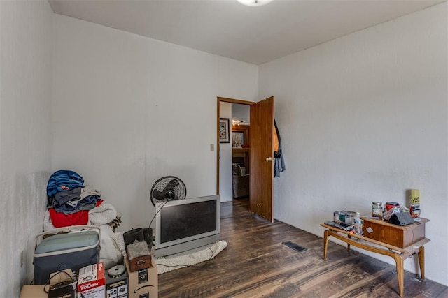 interior space featuring visible vents and wood finished floors