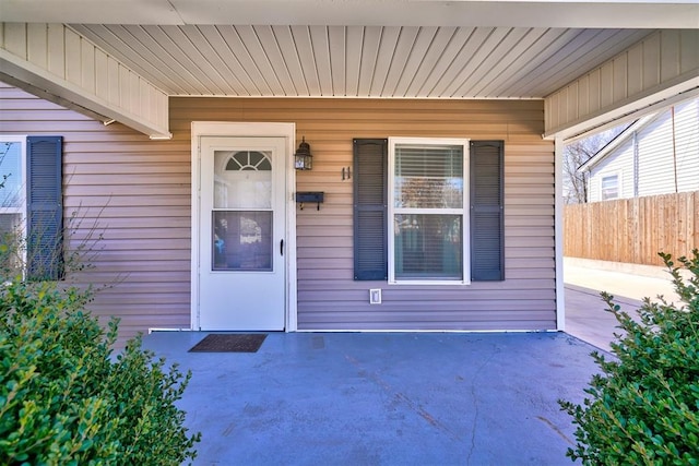 property entrance featuring fence