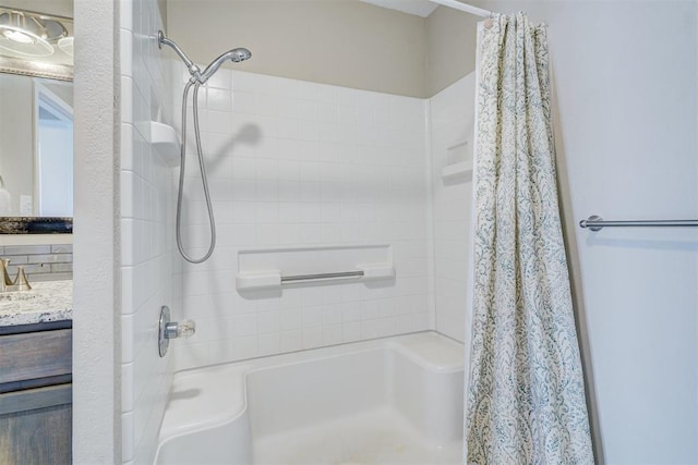 full bathroom featuring vanity and shower / bath combo