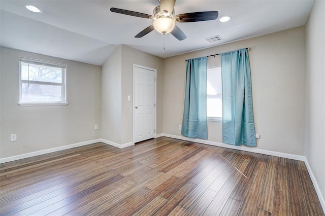 unfurnished room featuring wood finished floors, visible vents, baseboards, recessed lighting, and ceiling fan