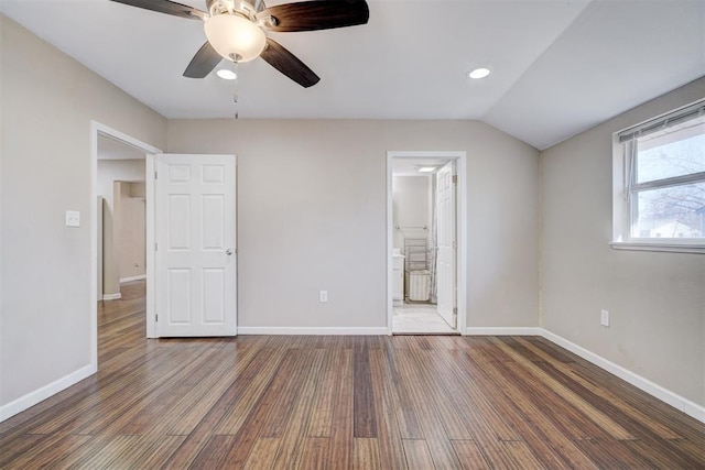 unfurnished bedroom featuring ceiling fan, baseboards, vaulted ceiling, recessed lighting, and wood finished floors