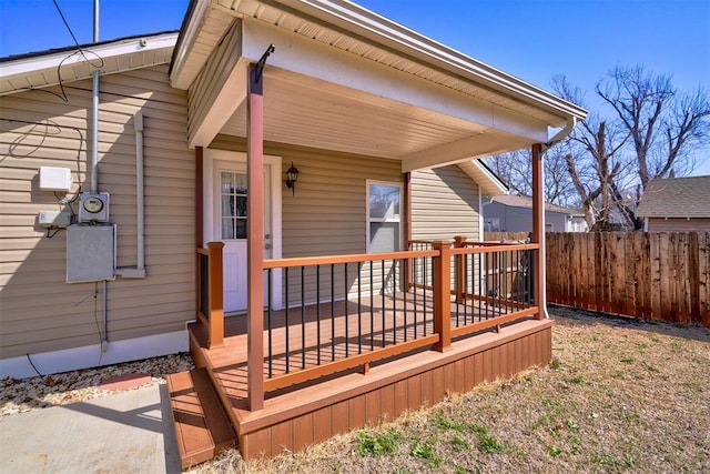 wooden deck featuring fence