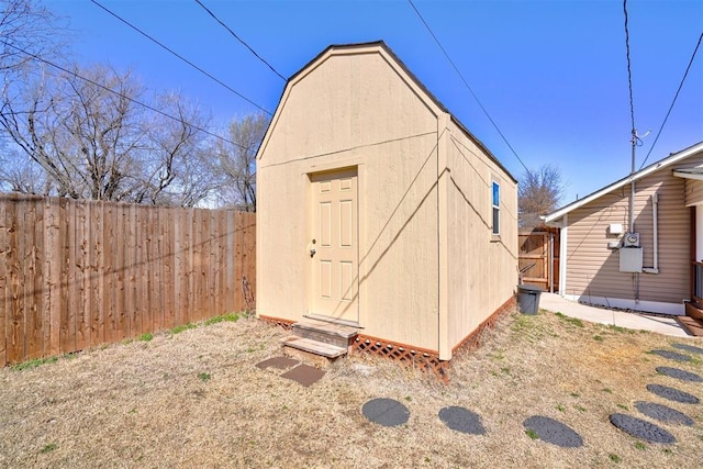 view of shed featuring a fenced backyard