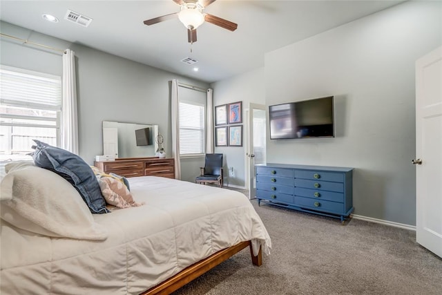 bedroom with a ceiling fan, carpet, visible vents, and baseboards