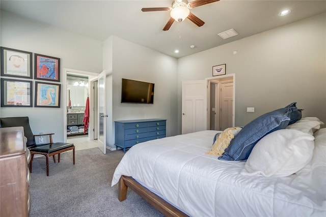 bedroom with visible vents, ensuite bathroom, a ceiling fan, recessed lighting, and carpet flooring