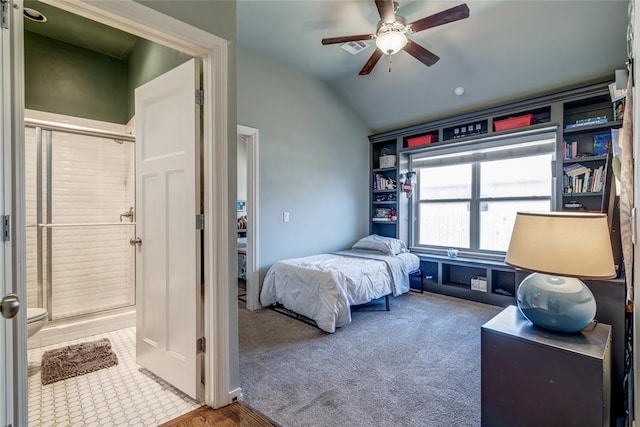 bedroom featuring lofted ceiling, carpet, and ceiling fan