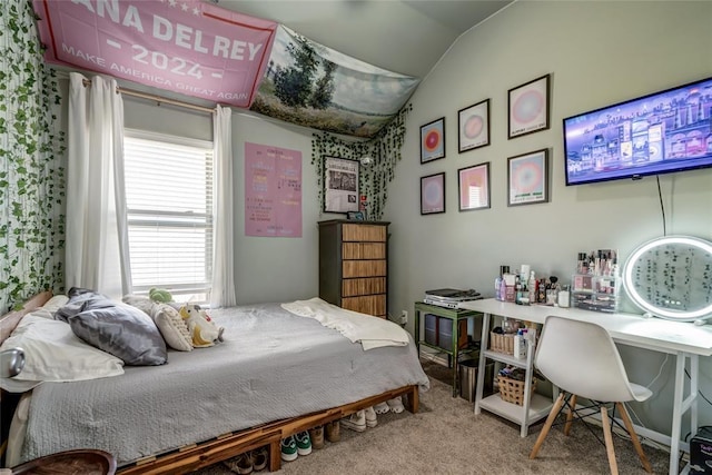 carpeted bedroom featuring vaulted ceiling