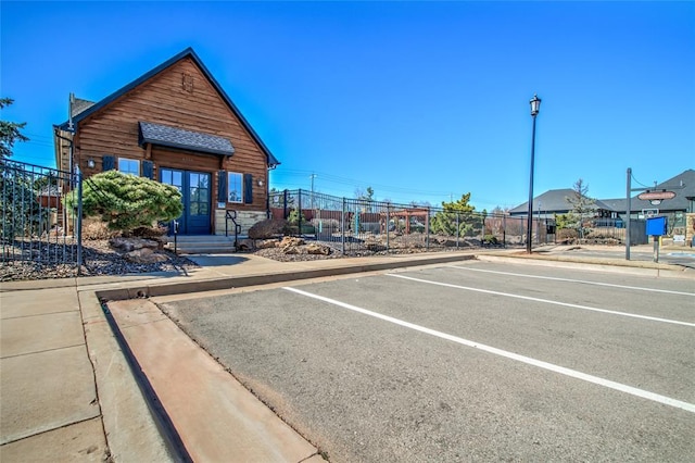 uncovered parking lot with fence