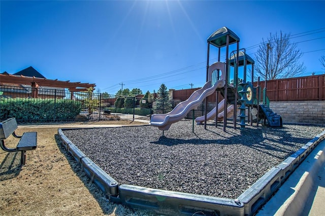 communal playground featuring fence