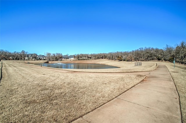 view of property's community featuring a water view