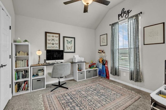 office space featuring vaulted ceiling, baseboards, carpet floors, and ceiling fan