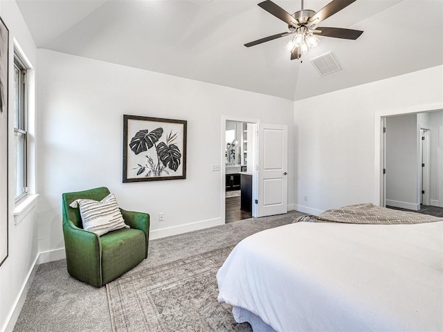 bedroom featuring visible vents, baseboards, and vaulted ceiling