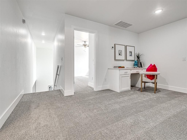 unfurnished office with recessed lighting, visible vents, light colored carpet, and baseboards