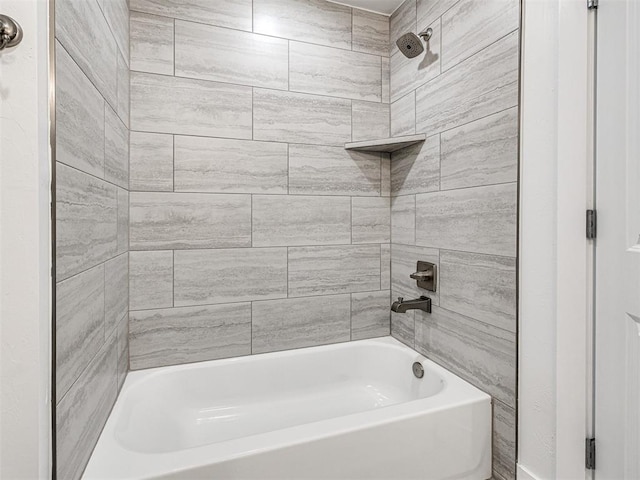 bathroom with shower / tub combination