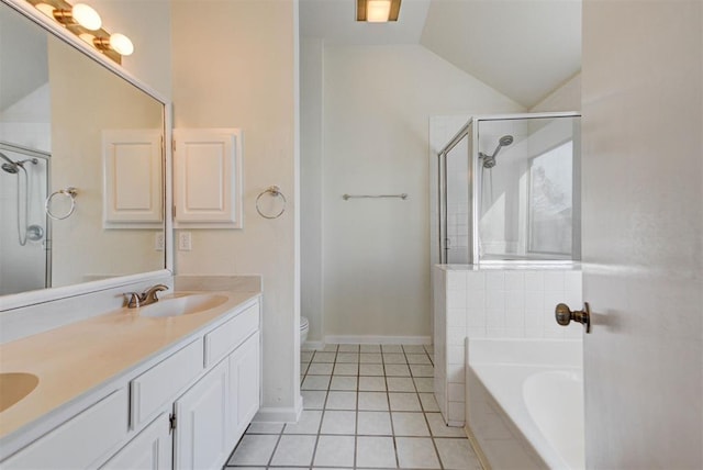 full bathroom with a shower stall, a garden tub, vaulted ceiling, tile patterned floors, and a sink