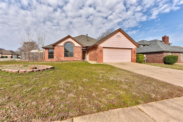 ranch-style home with fence, driveway, a front lawn, a garage, and brick siding