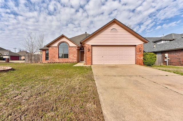 ranch-style home with a front yard, an attached garage, brick siding, and driveway