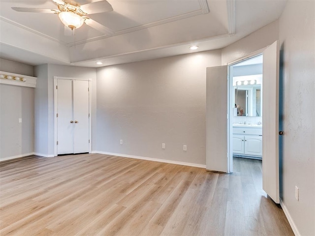 spare room featuring recessed lighting, baseboards, light wood-style floors, and a ceiling fan