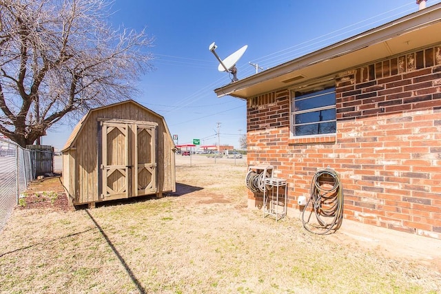 view of shed featuring a fenced backyard