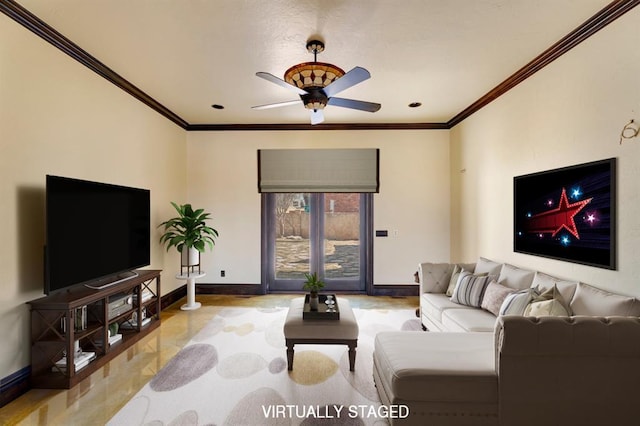 living room with baseboards, a ceiling fan, and crown molding