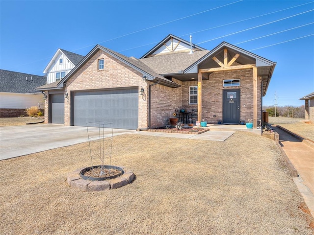 view of front facade with a garage, brick siding, roof with shingles, and driveway