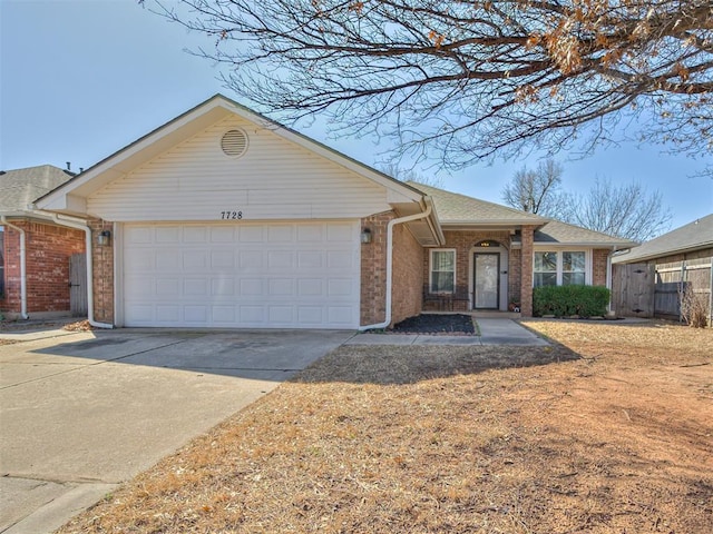 ranch-style house featuring brick siding, concrete driveway, a garage, and a shingled roof