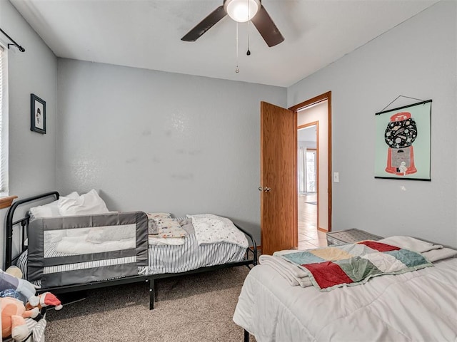 bedroom with carpet flooring and ceiling fan