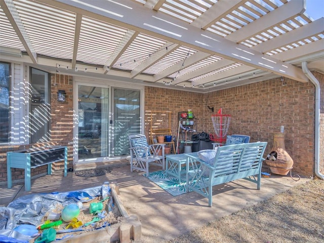 view of patio with outdoor dining space and a pergola