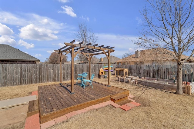 exterior space featuring a vegetable garden, a fenced backyard, a pergola, and a wooden deck