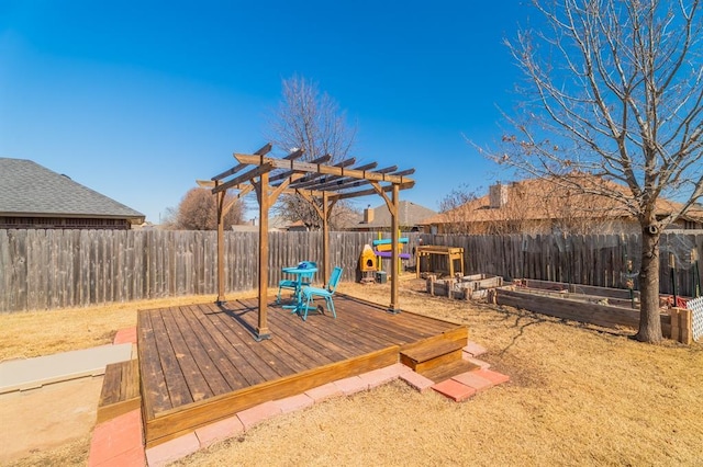 exterior space with a garden, a fenced backyard, a pergola, and a wooden deck