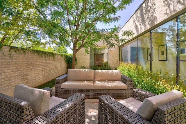 view of patio / terrace featuring fence private yard and an outdoor hangout area