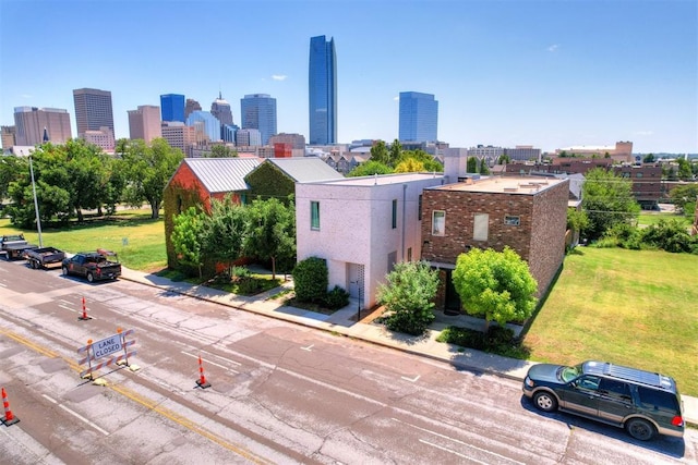 birds eye view of property with a city view