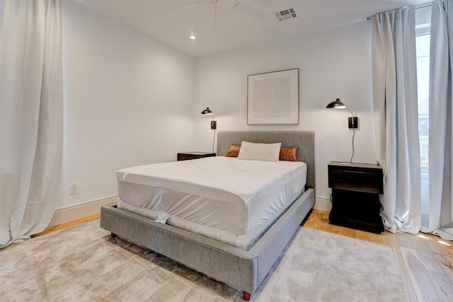 bedroom with visible vents, wood finished floors, recessed lighting, baseboards, and ceiling fan