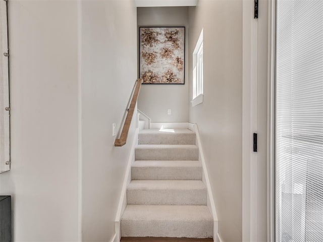 12 S Howard St, Edmond, OK 73003 - staircase featuring baseboards