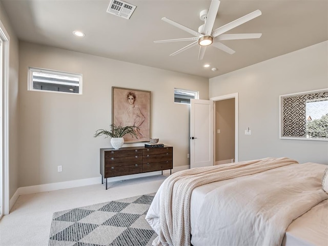 12 S Howard St, Edmond, OK 73003 - bedroom with recessed lighting, light colored carpet, visible vents, and baseboards
