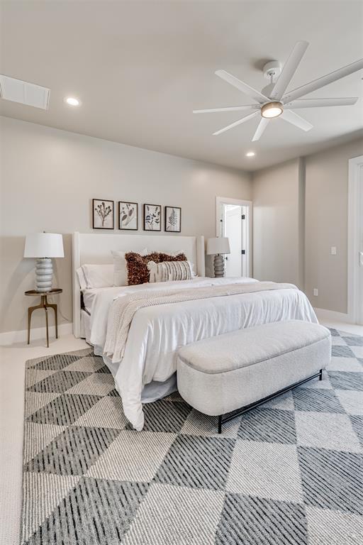 12 S Howard St, Edmond, OK 73003 - carpeted bedroom with a ceiling fan, recessed lighting, visible vents, and baseboards