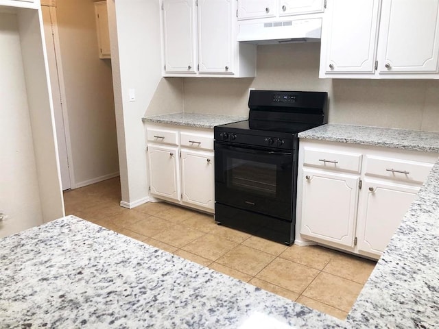 kitchen featuring white cabinetry, extractor fan, black / electric stove, and light countertops