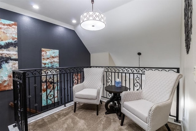 sitting room featuring vaulted ceiling, recessed lighting, and carpet floors